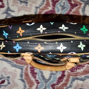 Authentic Louis Vuitton multi color trouville